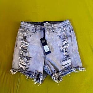 Distressed denim shorts